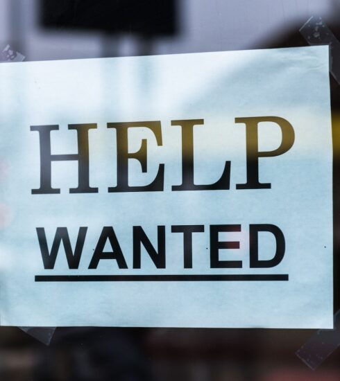 Help Wanted Sign on Glass